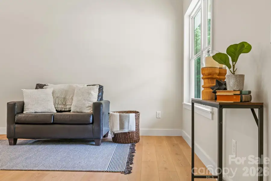 Furnished interior view inside a new home in , Waynesville (Image 7).