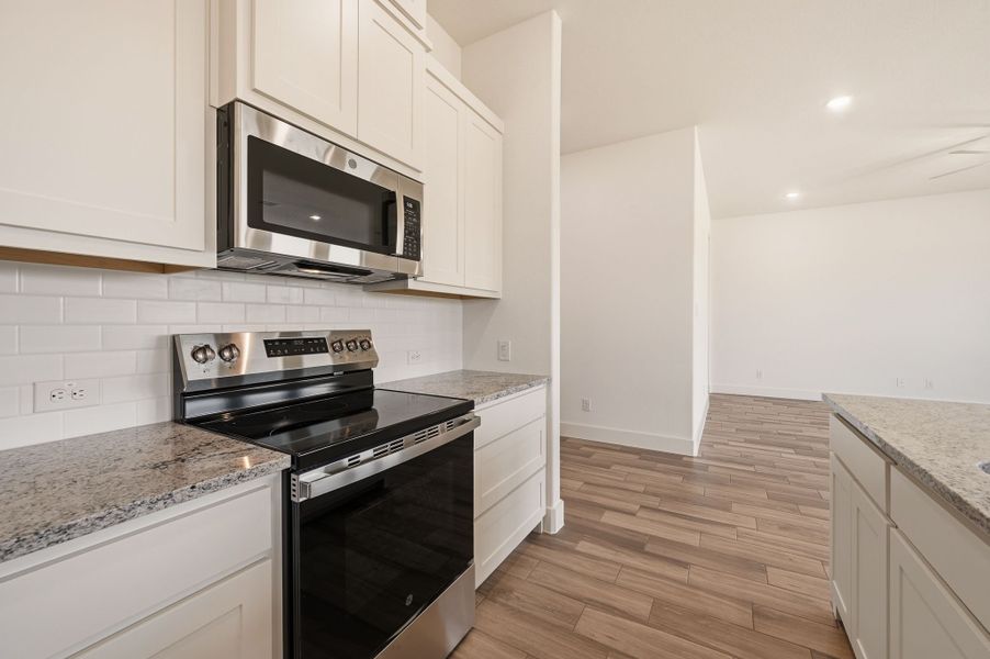 Furnished interior view inside a new home in Saddleback Estates, Boyd (Image 9).