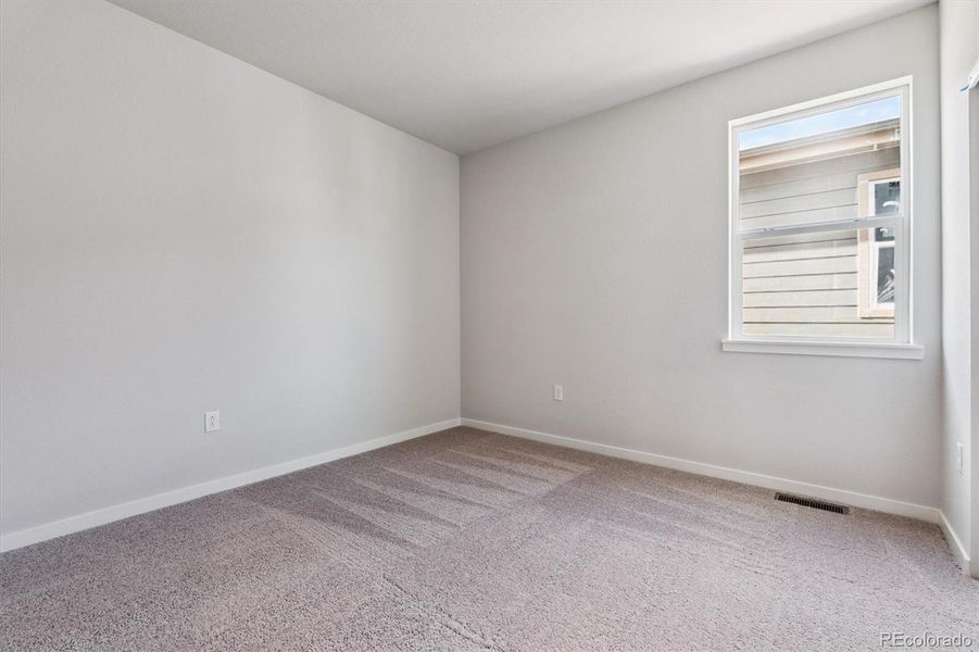 Spacious, unfurnished interior of a new home in Floret Collection at Parkdale Commons, Lafayette (Image 24).