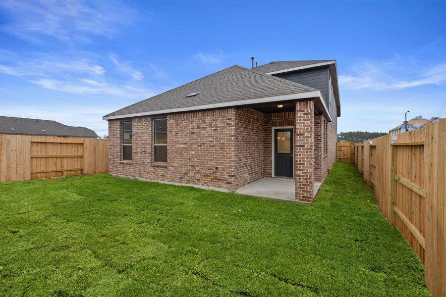 Exterior details and patio area of a home in Emory Glen, Magnolia (Image 20).