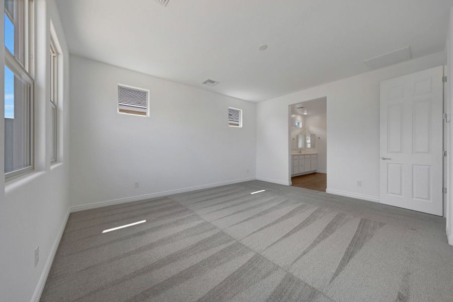 Spacious, unfurnished interior of a new home in Miravida, Surprise (Image 12).