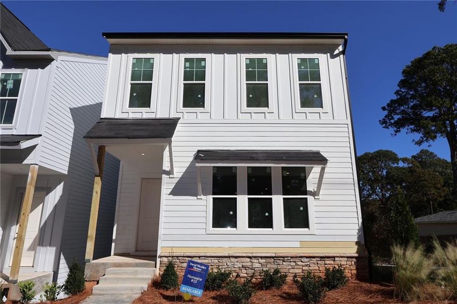 Front exterior of a new home in Celesta, Decatur, GA, highlighting curb appeal (Image 1). Front exterior of a new home in Celesta, Decatur, GA, highlighting curb appeal (Image 1).
