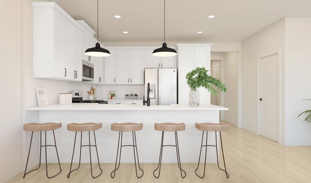 Kitchen with peninsula island and pendant lighting