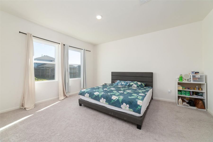 Furnished interior view inside a new home in Sunterra, Katy (Image 10).