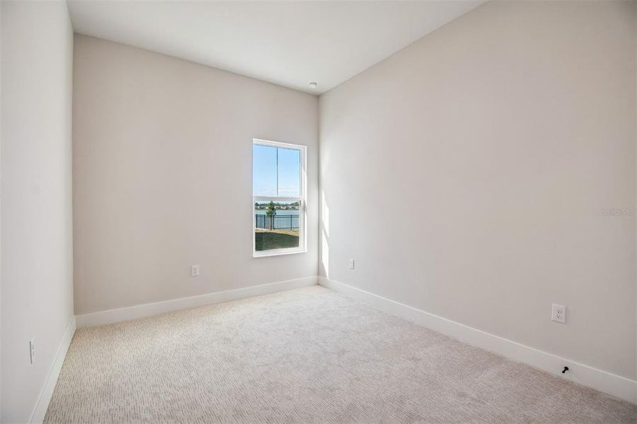 Spacious, unfurnished interior of a new home in Emerald Landing at Waterside at Lakewood Ranch – Lake Series, Sarasota (Image 37).
