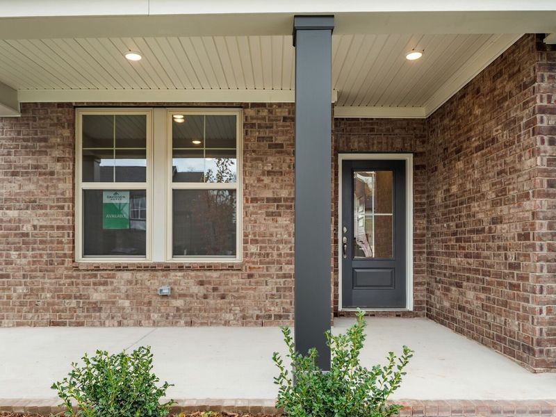 Exterior details and patio area of a home in Woods Crossing, Gallatin (Image 4).