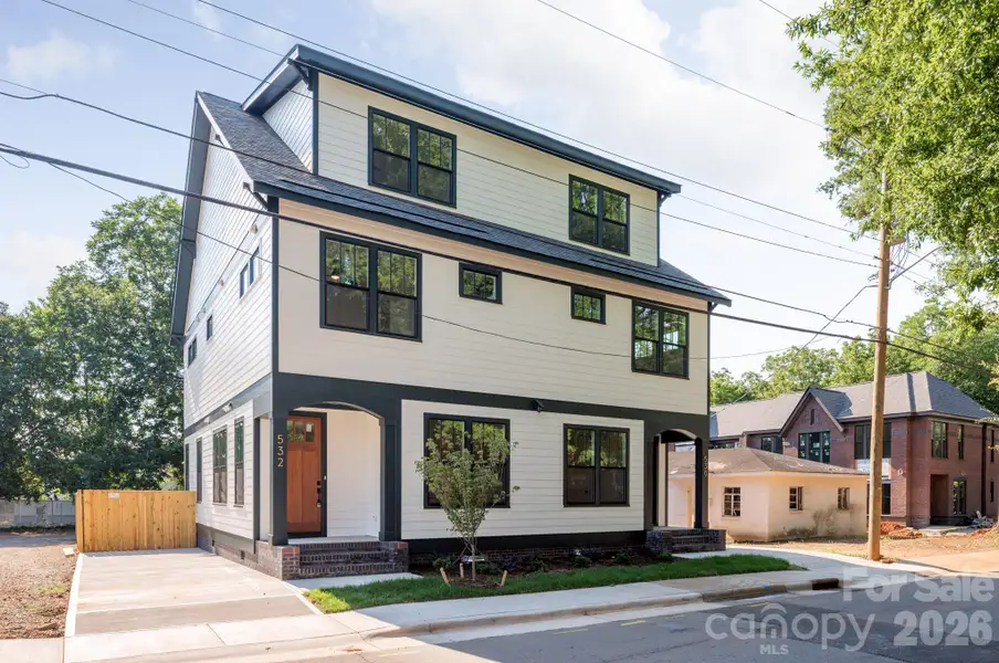 Front exterior of a new home in , Charlotte, NC, highlighting curb appeal (Image 21). Front exterior of a new home in , Charlotte, NC, highlighting curb appeal (Image 21).