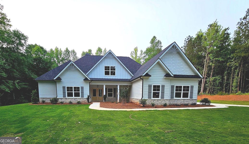 Front exterior of a new home in Cate's Farm, Newnan, GA, highlighting curb appeal (Image 1).