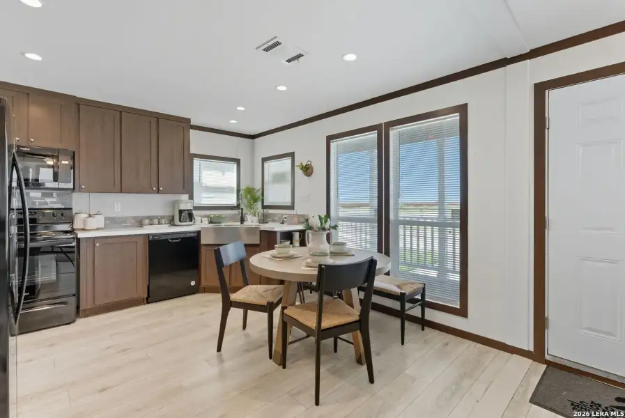 Furnished interior view inside a new home in , Seguin (Image 12).