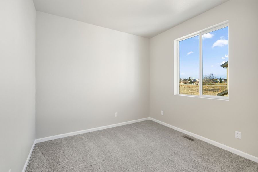 Spacious, unfurnished interior of a new home in Highlands Preserve, Mead (Image 18).