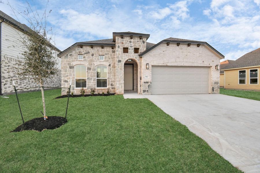 Example of completed home with similar plan. As-built colors and selections may vary.