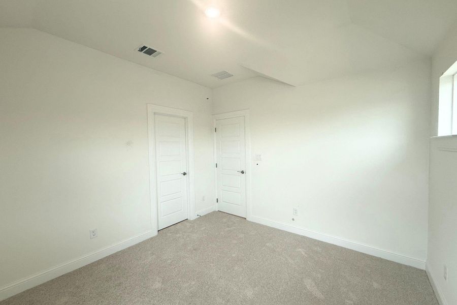 Neutral tone wall paint with light-colored carpeting Neutral tone wall paint with light-colored carpeting