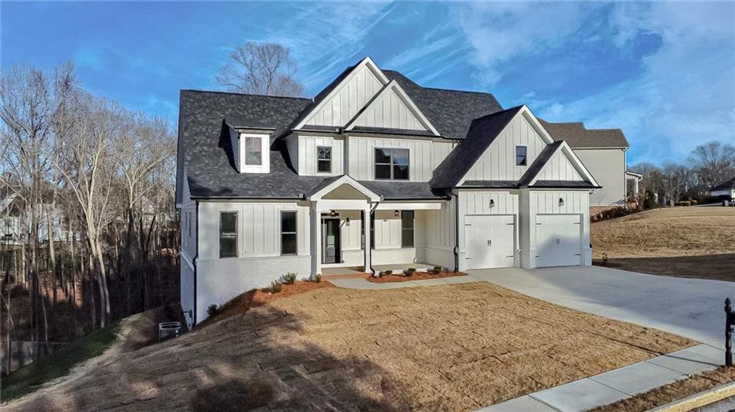 Front exterior of a new home in , Waleska, GA, highlighting curb appeal (Image 16).