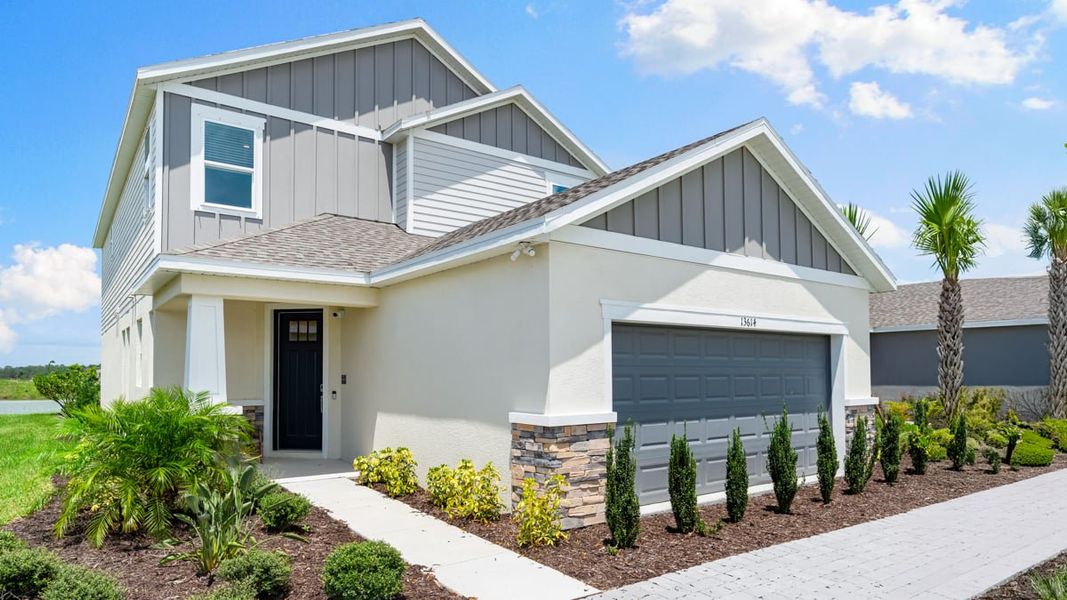 Representative exterior photo of a completed home built from the Anastasia by Taylor Morrison in Firethorn, Parrish, FL (Image 1).