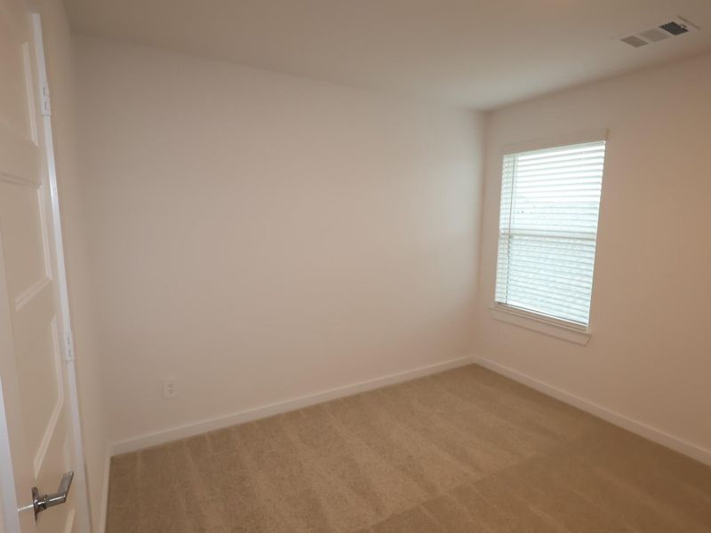 Spacious, unfurnished interior of a new home in Wildrye, Waller (Image 25).