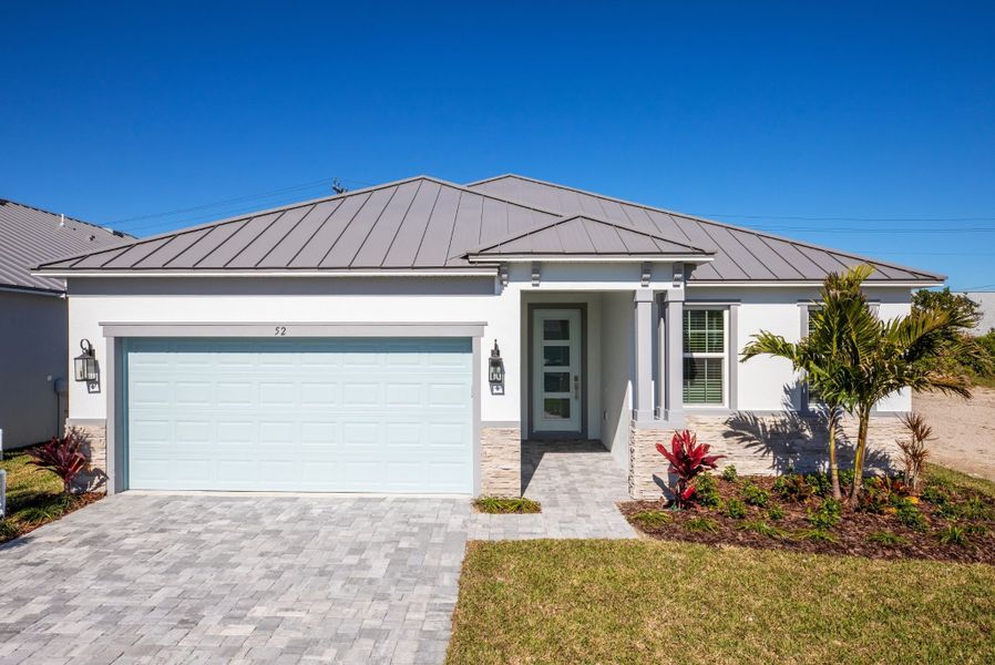 Representative exterior photo of a completed home built from the Melody by Maronda Homes in Cape Coral, Cape Coral, FL (Image 21).