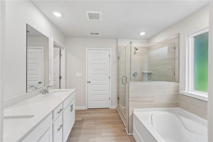 Furnished interior view inside a new home in Hemingway - Reserve Series, Cumming (Image 19). Furnished interior view inside a new home in Hemingway - Reserve Series, Cumming (Image 19).