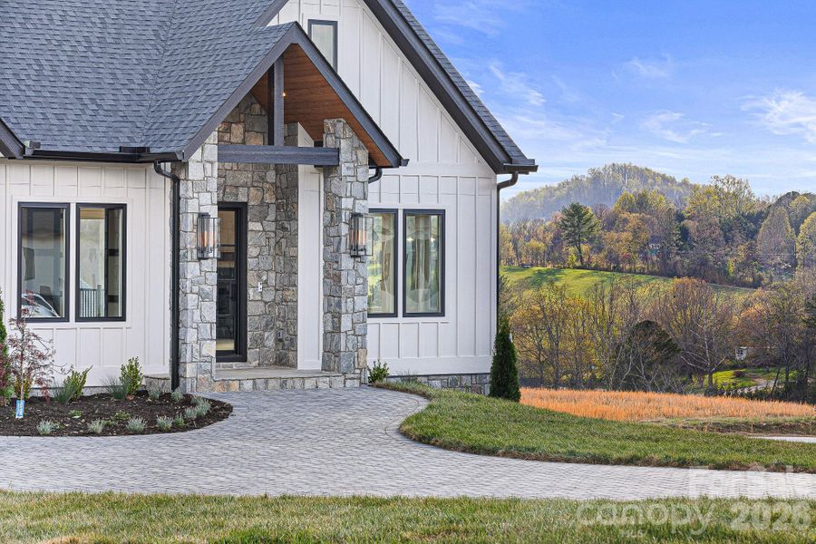 Exterior details and patio area of a home in , Fletcher (Image 33).