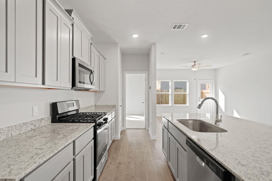 Furnished interior view inside a new home in Riverwood Ranch, Angleton (Image 10).