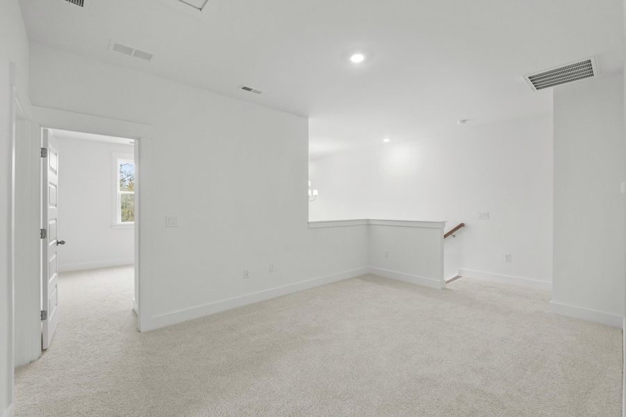 Spacious, unfurnished interior of a new home in Long Bay Golf Club, Longs (Image 33).