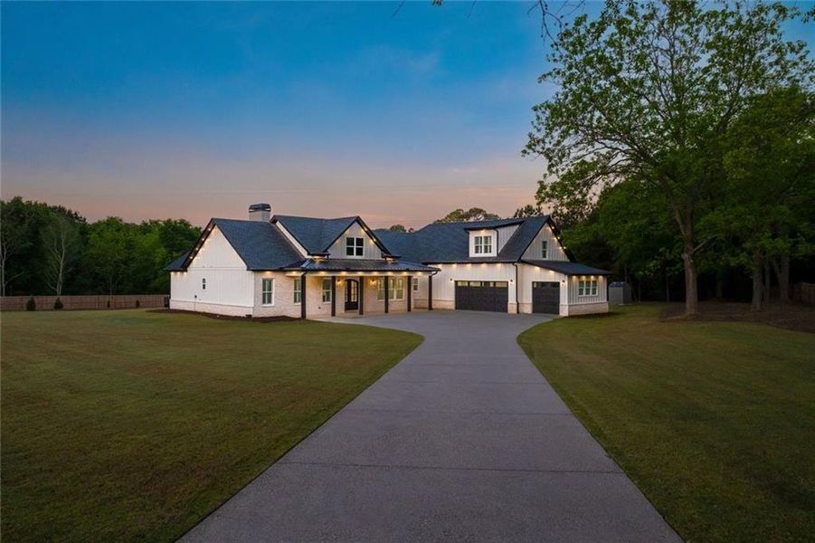 Front exterior of a new home in , Bethlehem, GA, highlighting curb appeal (Image 24).