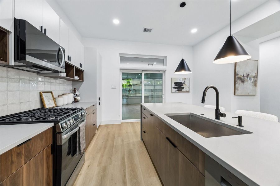 Every finish was intentionally selected by VIARQ Designers, combining warm wood tones, textured surfaces, and clean modern lines into a timeless design.