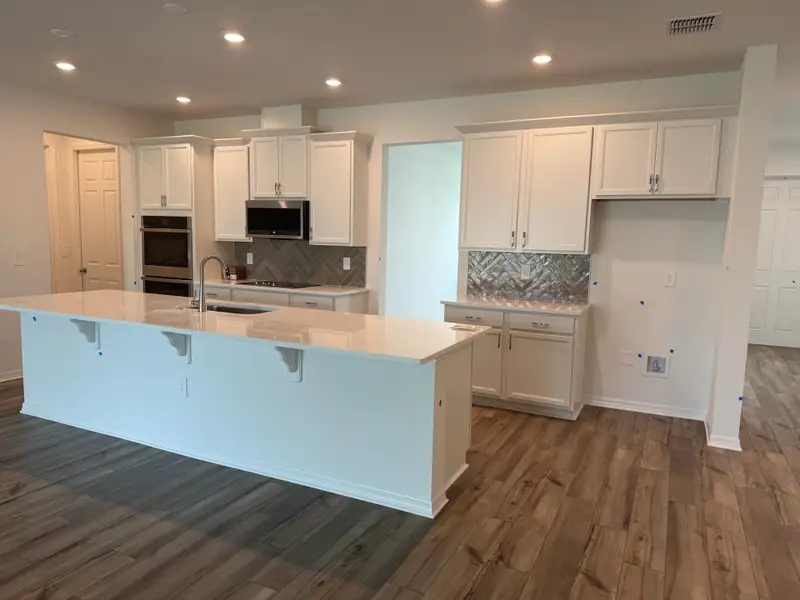 Furnished interior view inside a new home in Country Club Estates, Palm Bay (Image 2). Furnished interior view inside a new home in Country Club Estates, Palm Bay (Image 2).