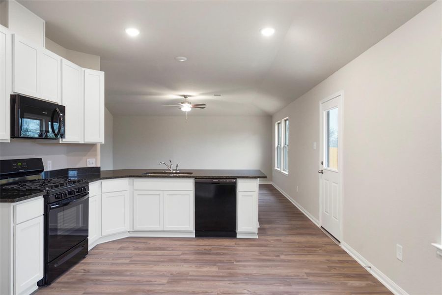 Furnished interior view inside a new home in Lexington Heights, Willis (Image 7).