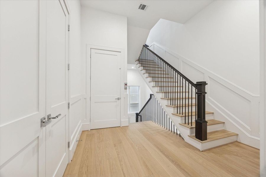 Second floor landin open to the laundry room