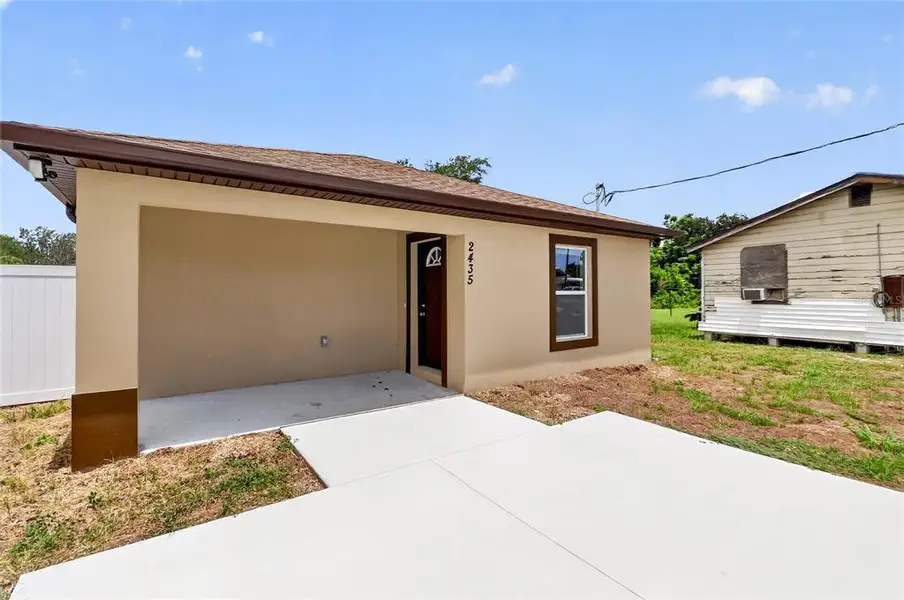 Exterior details and patio area of a home in , Winter Haven (Image 4). Exterior details and patio area of a home in , Winter Haven (Image 4).