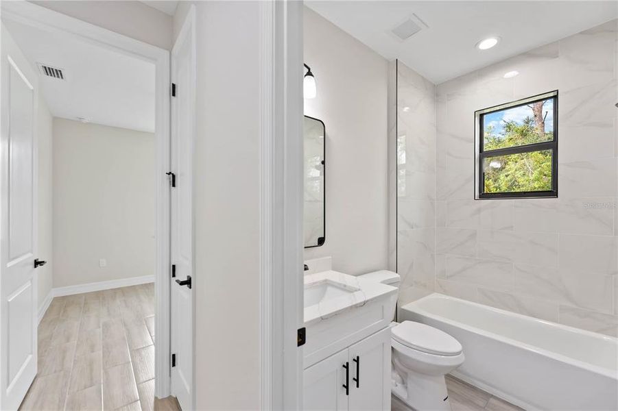 Furnished interior view inside a new home in , Port Charlotte (Image 14).