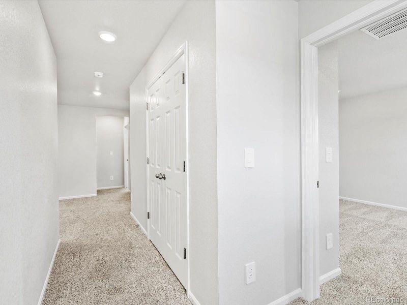 Spacious, unfurnished interior of a new home in Ridgeline Vista: The Canyon Collection, Brighton (Image 14).