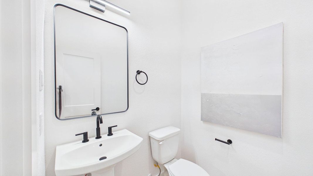 Downstairs 1/2 guest bathroom Downstairs 1/2 guest bathroom