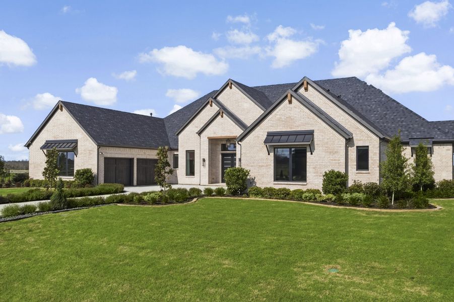Front exterior of a new home in Ridge Pointe Estates, McLendon-Chisholm, TX, highlighting curb appeal (Image 28). Front exterior of a new home in Ridge Pointe Estates, McLendon-Chisholm, TX, highlighting curb appeal (Image 28).
