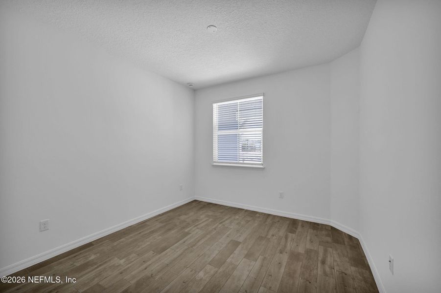Spacious, unfurnished interior of a new home in Del Webb Wildlight, Yulee (Image 23).