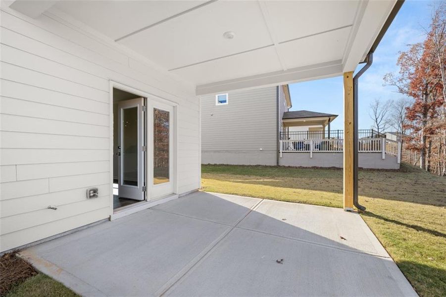 Exterior details and patio area of a home in Falcon Landing, Gainesville (Image 28).