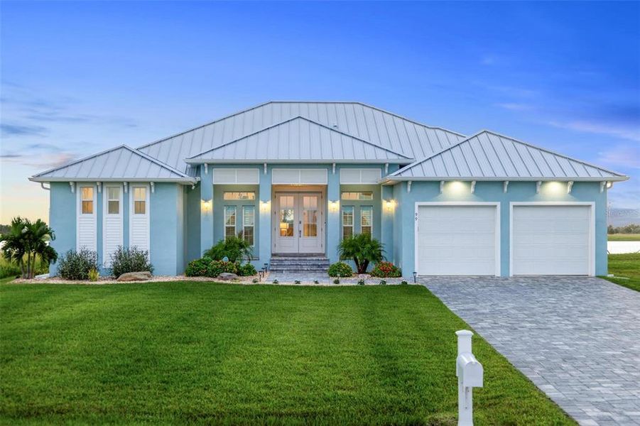 Front exterior of a new home in , Placida, FL, highlighting curb appeal (Image 21).
