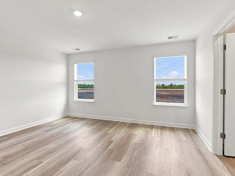 Spacious, unfurnished interior of a new home in Waterside - Boardwalk Series, Longs (Image 12).