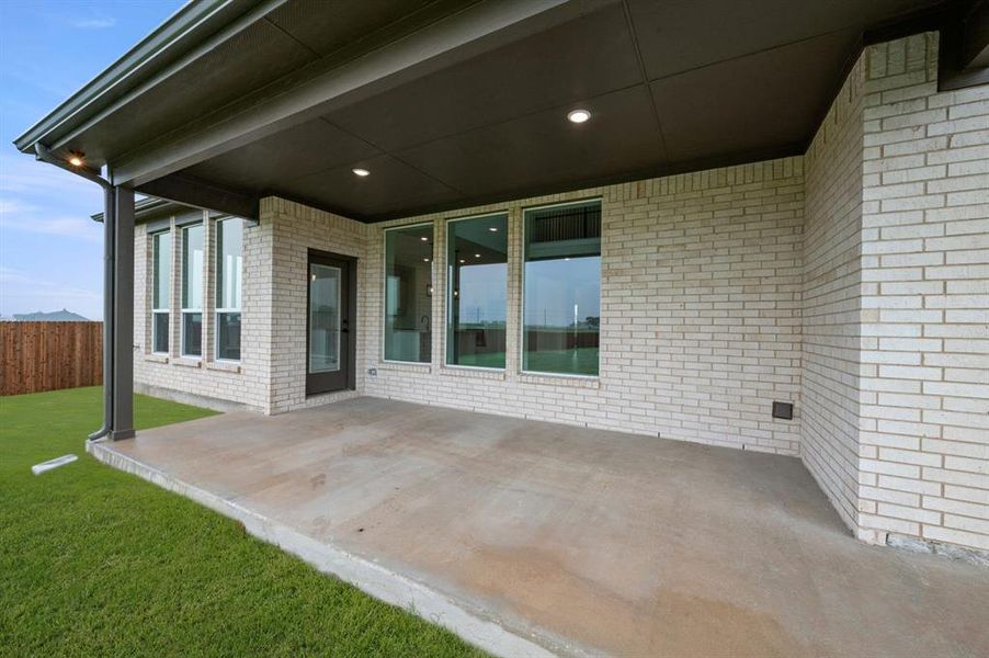 Exterior details and patio area of a home in Coyote Crossing, Godley (Image 3).