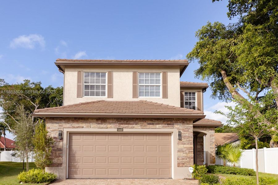 Front exterior of a new home in , Tamarac, FL, highlighting curb appeal (Image 30).