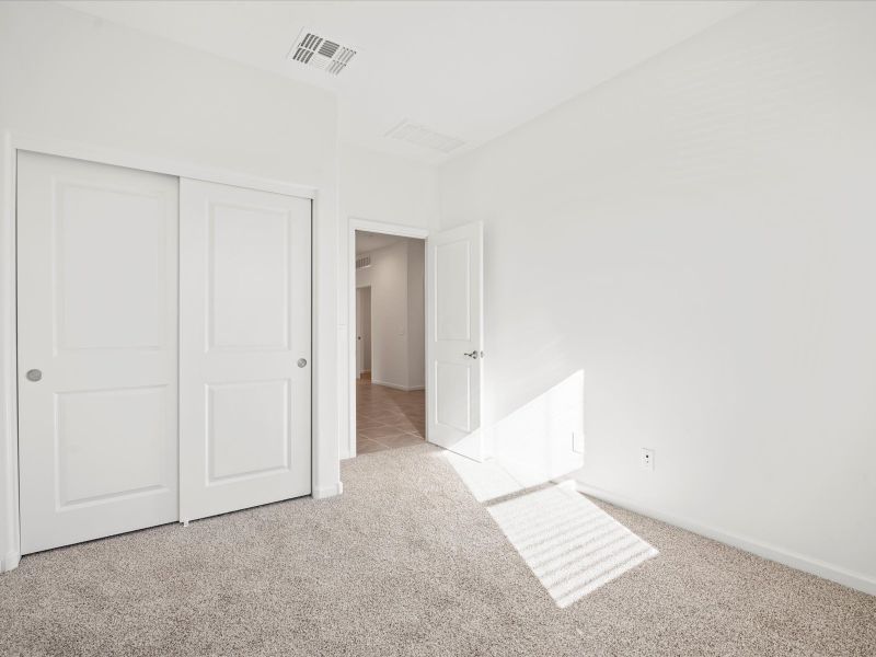 Spacious, unfurnished interior of a new home in Las Patrias at Star Valley Phase III - Premier Series, Tucson (Image 13).