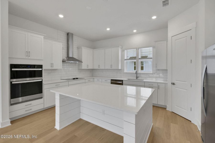 Furnished interior view inside a new home in North Beach Townhomes, Jacksonville Beach (Image 15).