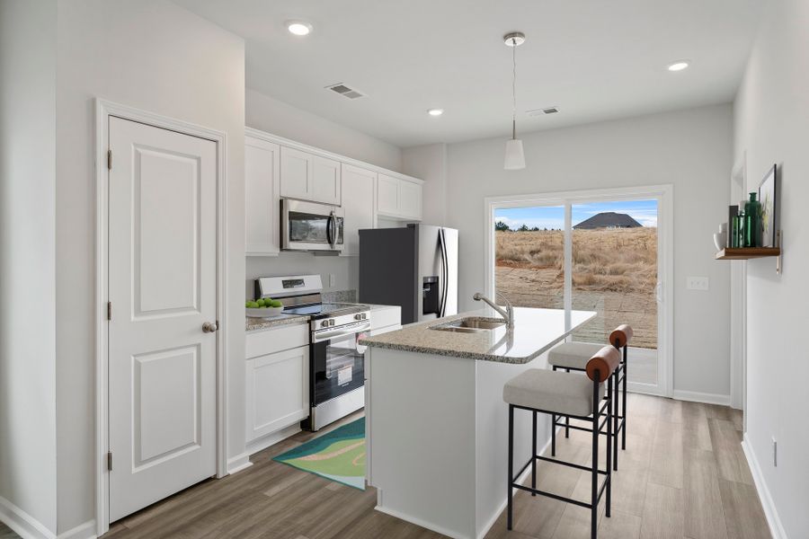 Representative furnished interior of a home built from the Baker - Genesis Value Collection by Mungo Homes in Bluefield, Lexington (Image 3).