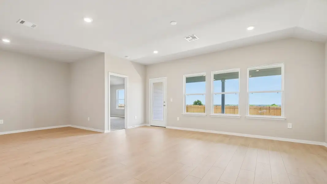 Spacious, unfurnished interior of a new home in Carillon, Manor (Image 15).