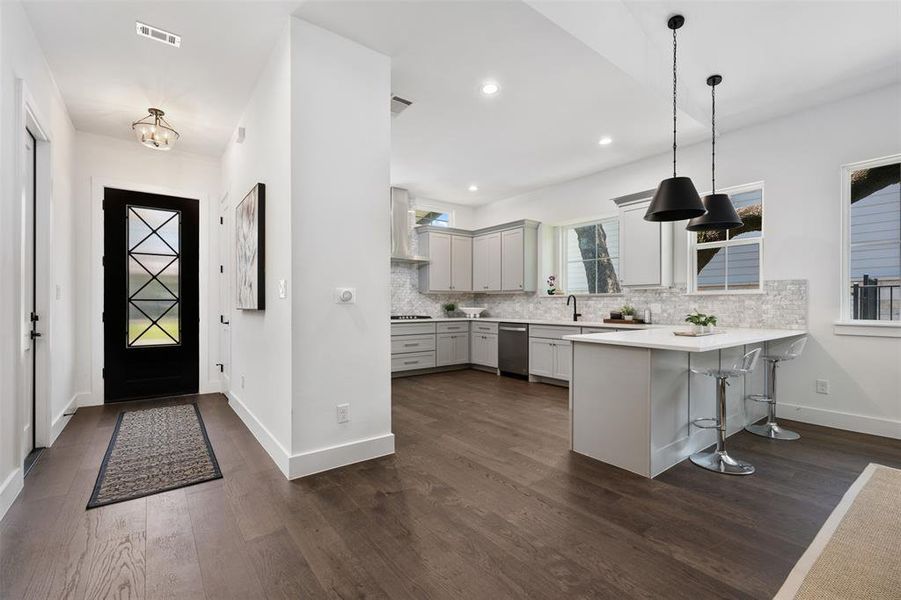 This floor plan is a stunner! High ceilings, open concept, you walk in and feel home.