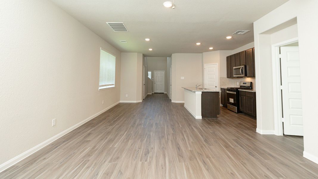 Family Room to Dining Area and Kitchen