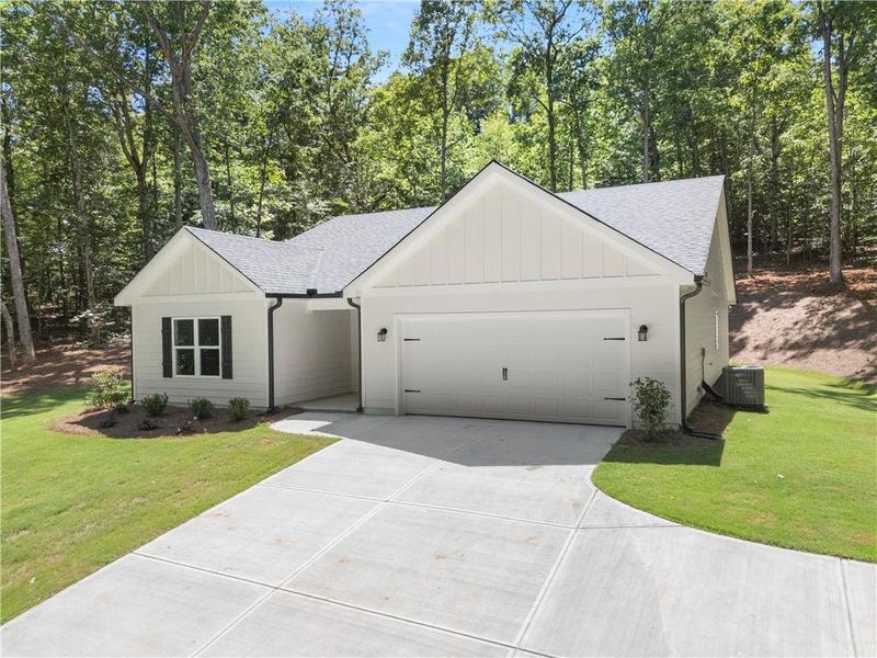 Front exterior of a new home in , Martin, GA, highlighting curb appeal (Image 20). Front exterior of a new home in , Martin, GA, highlighting curb appeal (Image 20).