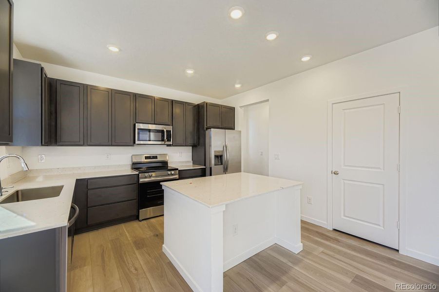 Furnished interior view inside a new home in Ken-Caryl Ranch: The Pioneer Collection, Littleton (Image 6).