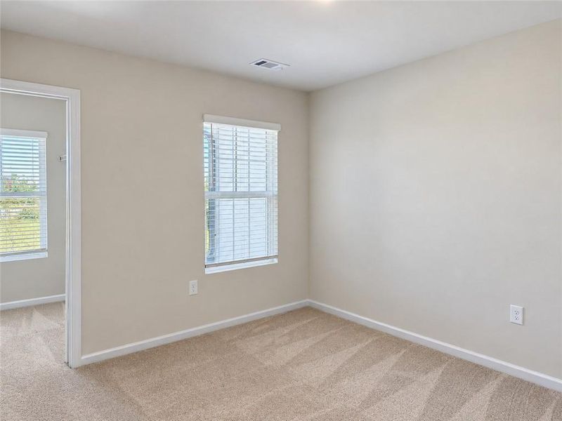 Spacious, unfurnished interior of a new home in Lake Carlton, Loganville (Image 11).