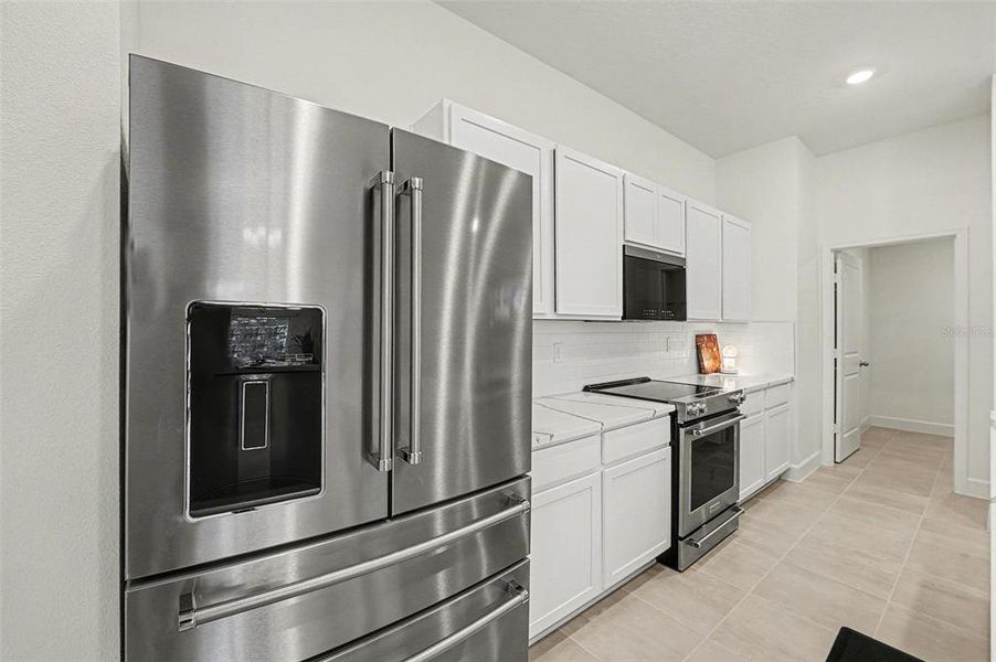 Furnished interior view inside a new home in , Haines City (Image 26). Furnished interior view inside a new home in , Haines City (Image 26).